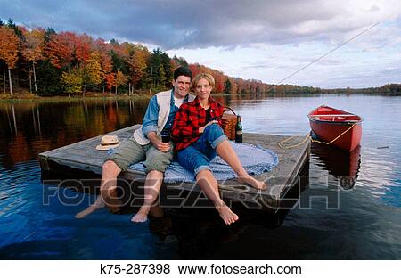 picnic on a dock in a lake View Large Photo Image Stock Photo - picnic on a dock in a lake. Fotosearch