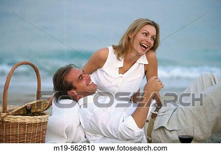 Stock Image - picnic on the beach. Fotosearch