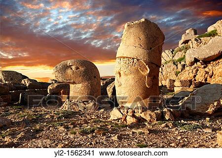 Pictures of the statues of around the tomb of Commagene King Antochus 1 on the top of Mount Nemrut, Turkey. View Large Photo Image Stock Image - Pictures of the statues of around the tomb of Commagene King Antochus 1 on the top of Mount Nemrut, Turkey.. Fotosearch