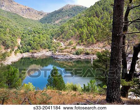 Piedralaves reservoir in the Sierra de Gredos. Avila. Castilla Leon. Spain. View Large Photo Image Picture - Piedralaves reservoir in the Sierra de Gredos. Avila. Castilla Leon. Spain.. Fotosearch