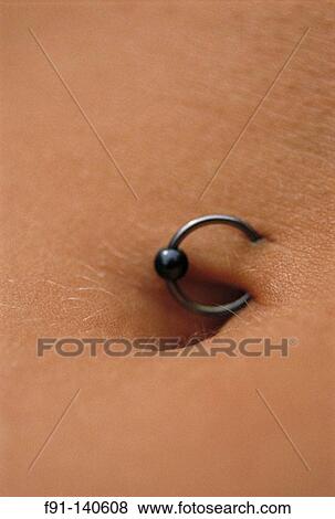 Pierced belly button View Large Photo Image Stock Photo - Pierced belly button. Fotosearch
