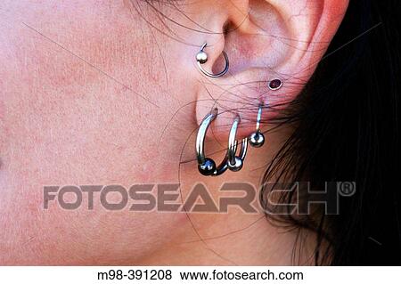 Stock Photo - Pierced ear. Fotosearch