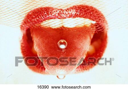 Stock Image - Pierced tongue. Fotosearch