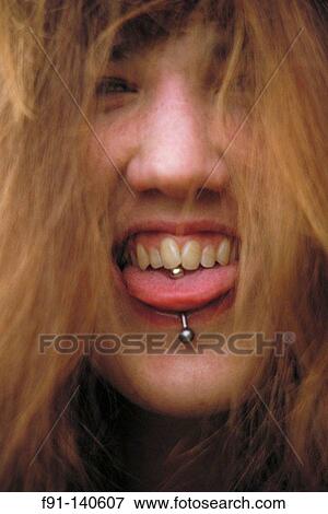 Stock Photo - Pierced tongue. Fotosearch