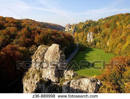 Pieskowa Skala Castle and Hercules Club Rock in Ojcow National Park at fall, Poland View Large Photo Image Stock Photo - Pieskowa Skala Castle and Hercules Club Rock in Ojcow National Park at fall, Poland. Fotosearch