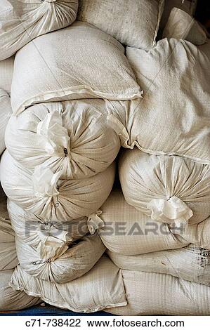 Pile of white sand bags View Large Photo Image Stock Image - Pile of white sand bags. Fotosearch