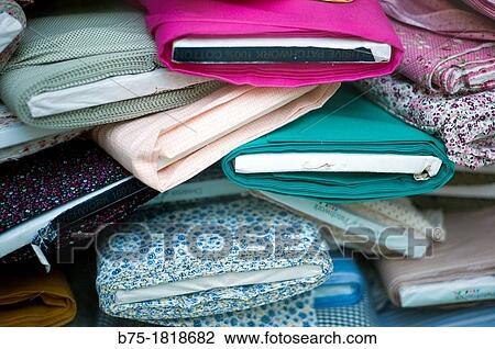 piled fabric in store, warehouse View Large Photo Image Stock Image - piled fabric in store, warehouse. Fotosearch