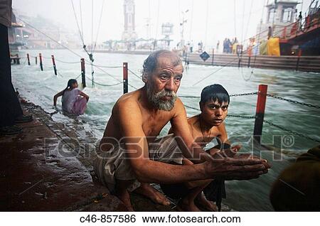 Pilgrim bathing on the Ganges, Haridwar. Uttarakhand, India View Large Photo Image Stock Photograph - Pilgrim bathing on the Ganges, Haridwar. Uttarakhand, India. Fotosearch