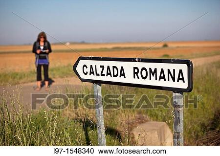 Pilgrim checking map along the Camino de Santiago View Large Photo Image Stock Image - Pilgrim checking map along the Camino de Santiago. Fotosearch