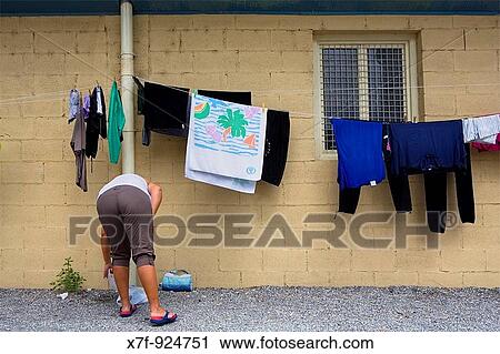 Pilgrim hanging clothes on washing line in Pilgrim's hostel Zubiri Navarra Spain Camino de Santiago View Large Photo Image Stock Image - Pilgrim hanging clothes on washing line in Pilgrim's hostel Zubiri Navarra Spain Camino de Santiago. Fotosearch