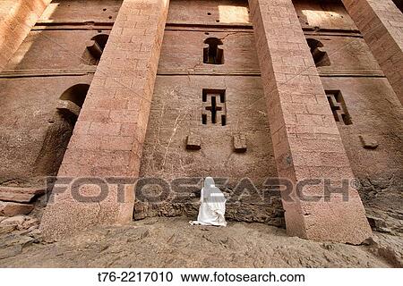 pilgrim praying at Bet Medhane Alem rock hewn church in Lalibela, Ethiopia. View Large Photo Image Stock Image - pilgrim praying at Bet Medhane Alem rock hewn church in Lalibela, Ethiopia.. Fotosearch
