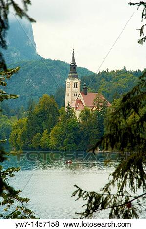 Pilgrimage Church of the Assumption of Mary on an island, Lake Bled, Slovenia View Large Photo Image Stock Photo - Pilgrimage Church of the Assumption of Mary on an island, Lake Bled, Slovenia. Fotosearch