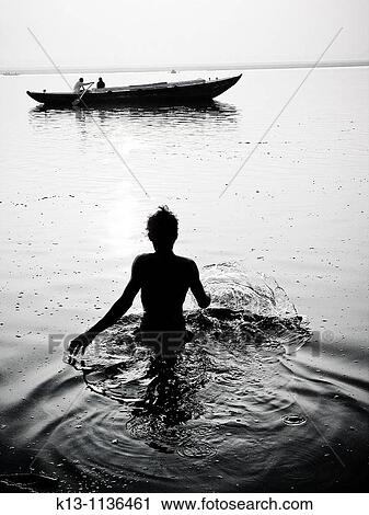 Pilgrims bathing at ghat steps on river Ganges Gats in Varanasi banaras Uttar Pradesh India View Large Photo Image Stock Image - Pilgrims bathing at ghat steps on river Ganges Gats in Varanasi banaras Uttar Pradesh India. Fotosearch