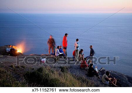 Pilgrims in Cape Finisterre At left the pilgrims burn the clothes used during the peregrination to Santiago de Compostela Finisterre Corua province Spain Camino de Santiago View Large Photo Image Stock Image - Pilgrims in Cape Finisterre At left the pilgrims burn the clothes used during the peregrination to Santiago de Compostela Finisterre Corua province Spain Camino de Santiago. Fotosearch