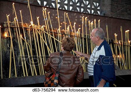 Pilgrims lighting candles, National Shrine of Our Lady of Aparecida, Brazil View Large Photo Image Picture - Pilgrims lighting candles, National Shrine of Our Lady of Aparecida, Brazil. Fotosearch