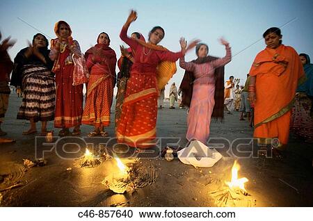 Pilgrims making offerings at the confluence of the river Ganges and the Bay of Bengal. Sagar Mela. Ganges River. India. View Large Photo Image Stock Image - Pilgrims making offerings at the confluence of the river Ganges and the Bay of Bengal. Sagar Mela. Ganges River. India.. Fotosearch