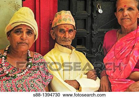 Pilgrims on the main shopping street near Ganges river View Large Photo Image Stock Image - Pilgrims on the main shopping street near Ganges river. Fotosearch