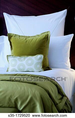 Pillows on the bed of Premier Suite Terrace Living Room of Mandarin Oriental Hotel Paris, Paris, France View Large Photo Image Stock Image - Pillows on the bed of Premier Suite Terrace Living Room of Mandarin Oriental Hotel Paris, Paris, France. Fotosearch