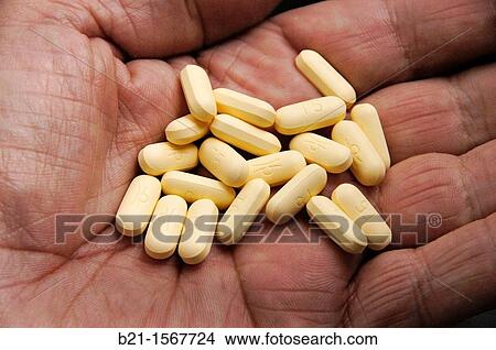 Picture - Pills addict. Fotosearch