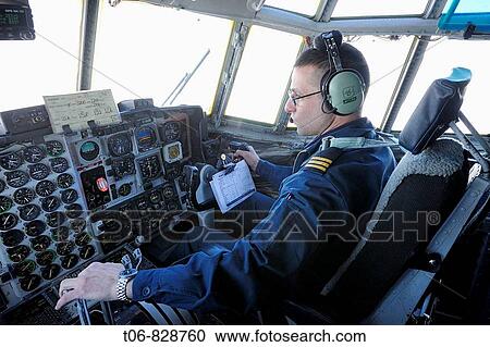 Pilote in Herkules cargo aircraft, Yellowknife, Northwest Territories, Canada View Large Photo Image Stock Image - Pilote in Herkules cargo aircraft, Yellowknife, Northwest Territories, Canada. Fotosearch