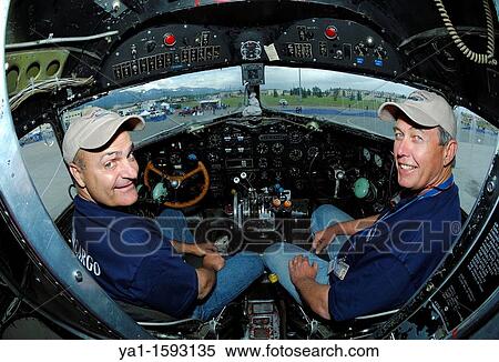 Pilots in cockpit of legendary old airliner Douglas DC-3 Dakota, Anchorage, Alaska, USA View Large Photo Image Stock Photography - Pilots in cockpit of legendary old airliner Douglas DC-3 Dakota, Anchorage, Alaska, USA. Fotosearch
