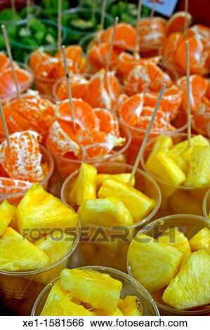 Pineapple, tangerine and kiwi, fruit View Large Photo Image Stock Photograph - Pineapple, tangerine and kiwi, fruit. Fotosearch