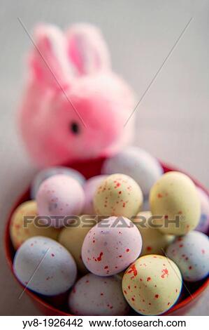 Pink bunny with colorful easter eggs View Large Photo Image Stock Image - Pink bunny with colorful easter eggs. Fotosearch