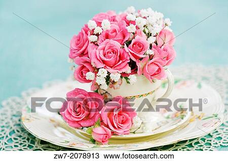 Pink Roses in Rose paterned Antique china tea cup with saucer and tea plate. View Large Photo Image Stock Image - Pink Roses in Rose paterned Antique china tea cup with saucer and tea plate.. Fotosearch