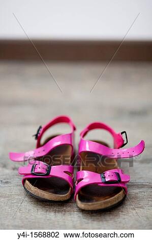 Pink sandals of a little girl View Large Photo Image Stock Image - Pink sandals of a little girl. Fotosearch