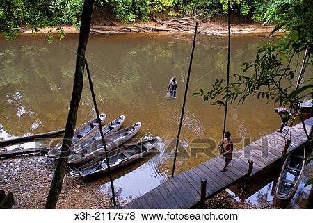 pirogues on the Kourou river, French Guiana, overseas department and region of France, Atlantic coast of South America. View Large Photo Image Stock Photo - pirogues on the Kourou river, French Guiana, overseas department and region of France, Atlantic coast of South America.. Fotosearch