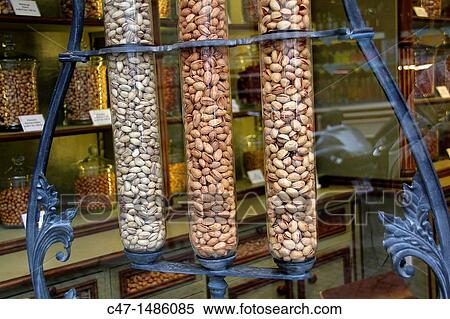 Stock Photography - Pistachios at the show window of the La Pistacherie shop at the Rue Quincampoix, Le Marais area, Paris, France. Fotosearch