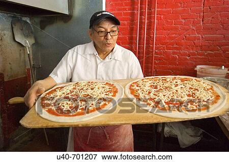 Pizza maker View Large Photo Image Stock Photo - Pizza maker. Fotosearch
