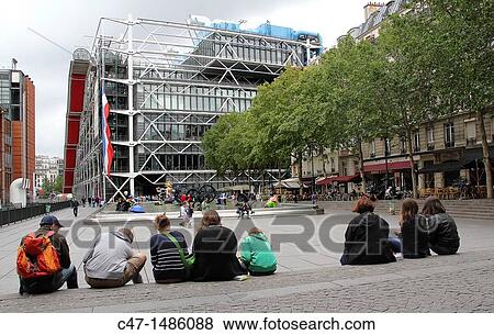 Place Stravinsky, between the Centre Pompidou and the Church of Saint-Merri, Paris, France View Large Photo Image Stock Photo - Place Stravinsky, between the Centre Pompidou and the Church of Saint-Merri, Paris, France. Fotosearch