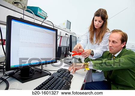 Stock Photo - Placement of tweezers to do an electrocardiogram, Biomedical Instrumentation Laboratory, Biomedical Engineering, CEIT (Center of Studies and Technical Research), University of Navarra, Donostia, Gipuzkoa, Basque Country, Spain. Fotosearch