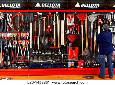 Placing products in the path of consumers of a hardware store, merchandising View Large Photo Image Stock Image - Placing products in the path of consumers of a hardware store, merchandising. Fotosearch