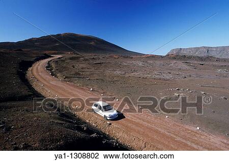 Plaine des Sables road (sands plain) on the way to Piton de la Fournaise volcano, La Reunion island (France), Indian Ocean View Large Photo Image Stock Image - Plaine des Sables road (sands plain) on the way to Piton de la Fournaise volcano, La Reunion island (France), Indian Ocean. Fotosearch