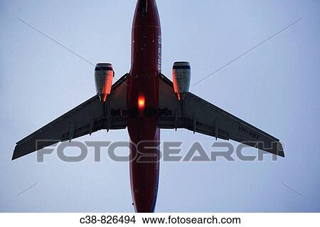 Plane landing at night, Gold Coast, Queensland, Australia View Large Photo Image Picture - Plane landing at night, Gold Coast, Queensland, Australia. Fotosearch