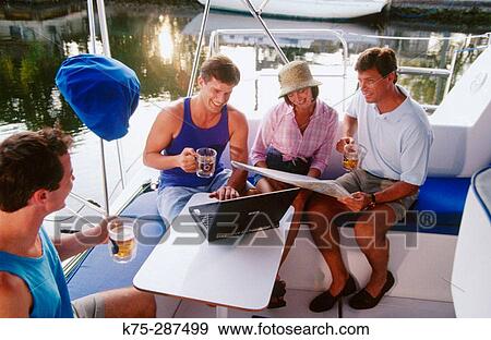Planning a boat trip View Large Photo Image Stock Photo - Planning a boat trip. Fotosearch