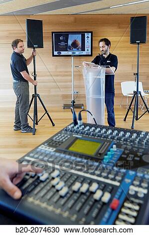 Plasma screen, lectern and sound mixer. Preparation audiovisual conference. Donostia. San Sebastian. Gipuzkoa. Basque Country. Spain. View Large Photo Image Stock Image - Plasma screen, lectern and sound mixer. Preparation audiovisual conference. Donostia. San Sebastian. Gipuzkoa. Basque Country. Spain.. Fotosearch
