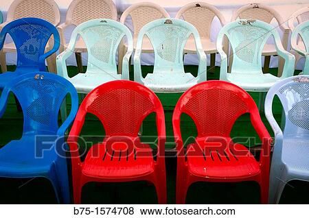 Plastic chairs, India, Asia, football stadium View Large Photo Image Stock Photo - Plastic chairs, India, Asia, football stadium. Fotosearch