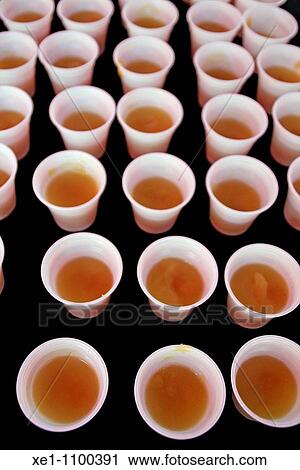 Plastic cups, infusion of tea. View Large Photo Image Stock Image - Plastic cups, infusion of tea.. Fotosearch