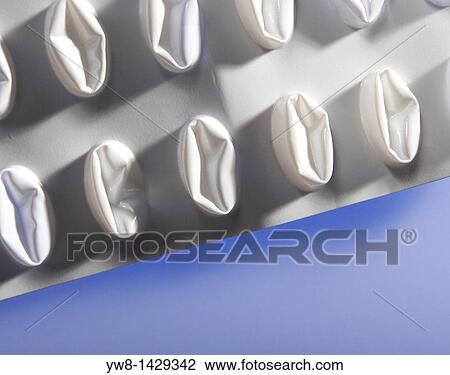 Stock Image - Plastic sheet of pills used. Fotosearch