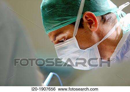Stock Photograph - plastic surgery, Surgeon, Operating room, Onkologikoa Hospital, Oncology Institute, Case Center for prevention, diagnosis and treatment of cancer, Donostia, San Sebastian, Gipuzkoa, Basque Country, Spain. Fotosearch
