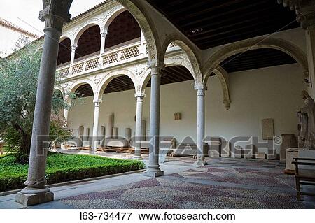 Plateresque courtyard of Hospital de Santa Cruz founded by Cardinal Pedro GonzBlez de Mendoza and built in the 16th century by Alonso de Covarrubias, Toledo. Castilla-La Mancha, Spain View Large Photo Image Stock Photo - Plateresque courtyard of Hospital de Santa Cruz founded by Cardinal Pedro GonzBlez de Mendoza and built in the 16th century by Alonso de Covarrubias, Toledo. Castilla-La Mancha, Spain. Fotosearch
