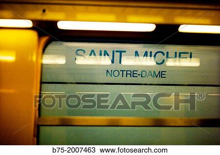 platform indication of Saint-Michele Notre-Dame, seen from the wagon of the Metro in Paris, France. View Large Photo Image Stock Image - platform indication of Saint-Michele Notre-Dame, seen from the wagon of the Metro in Paris, France.. Fotosearch