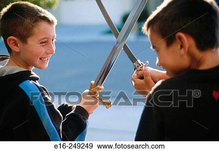 play sword fighting View Large Photo Image Stock Photo - play sword fighting. Fotosearch