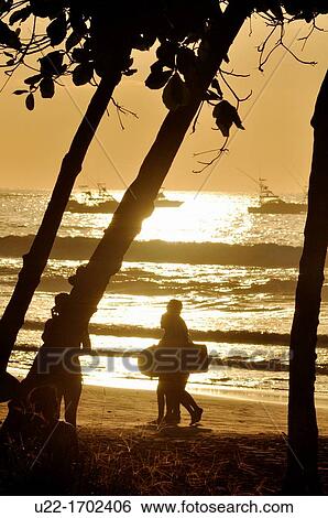 Playa Tamarindo Costa Rica: sunset at the beach View Large Photo Image Stock Photograph - Playa Tamarindo Costa Rica: sunset at the beach. Fotosearch