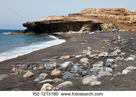 Playa y acantilados Pueblo de Ajuy Parque Rural de Betancuria Isla Fuerteventura Provincia Las Palmas Islas Canarias Espaa View Large Photo Image Stock Image - Playa y acantilados Pueblo de Ajuy Parque Rural de Betancuria Isla Fuerteventura Provincia Las Palmas Islas Canarias Espaa. Fotosearch