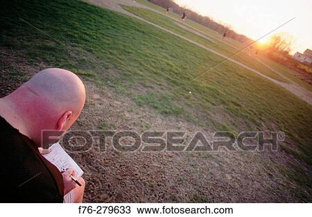 Player on men's softball team View Large Photo Image Stock Image - Player on men's softball team. Fotosearch