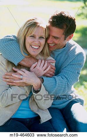 playful couple hugging View Large Photo Image Stock Image - playful couple hugging. Fotosearch